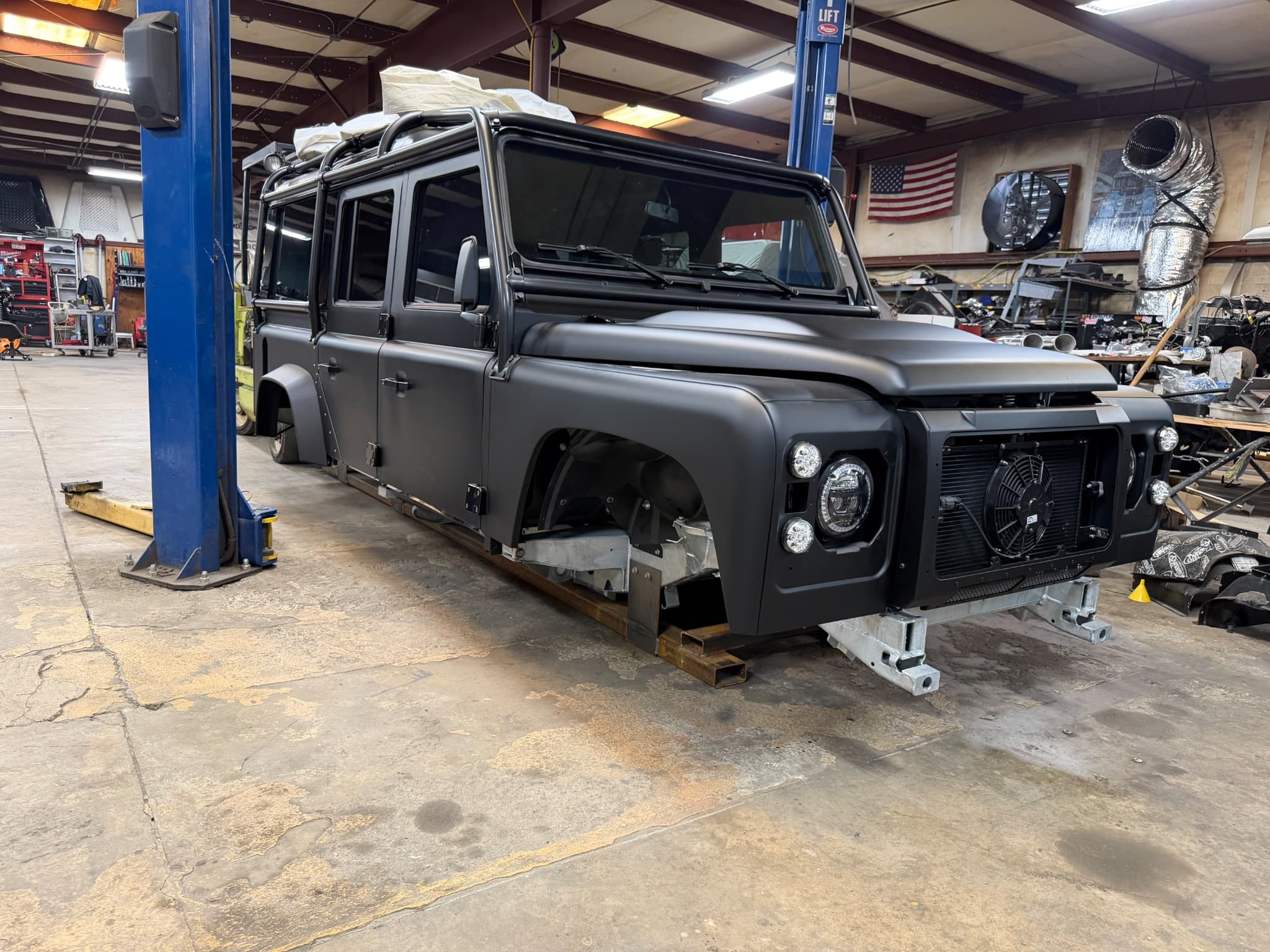 A Defender body on supports inside the LRC workshop
